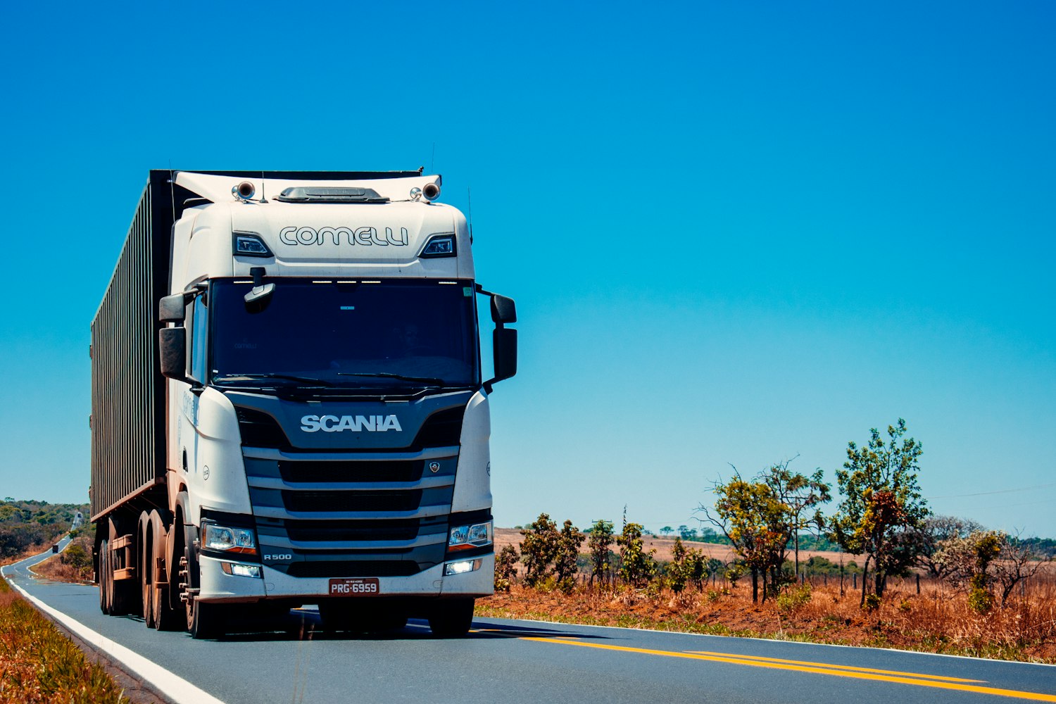 Apex Courier International freight truck on the highway